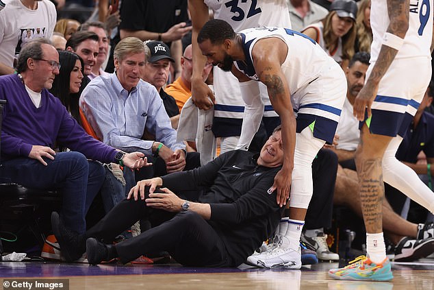 Finch clutches knee in pain after colliding with Conley with less than two minutes remaining