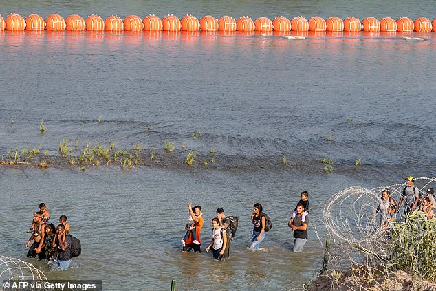 Migrants trying to ford the section of the river already have to navigate miles of barbed wire and a 1,000-foot floating barrier of buoys installed by order of the governor.