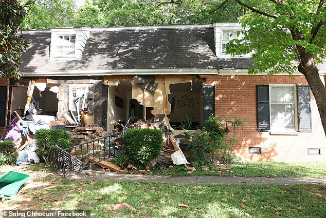 The front of the offender's house is seen above after the shooting.
