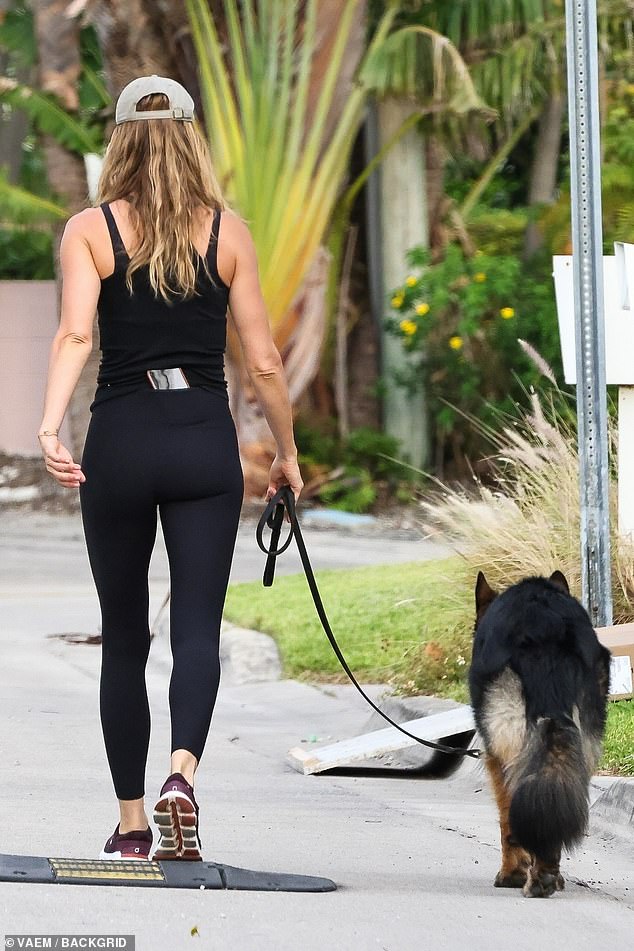 1714496554 304 Gisele Bundchen Radiates Sporty Chic in an All Black Tracksuit While