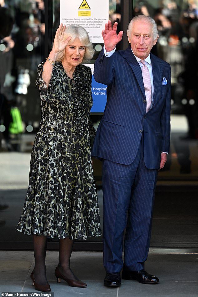 Camilla mirrored her husband's gestures today at University College Hospital Macmillan Cancer Center as a sign of support and protection.