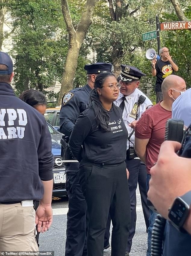 An employee of Shahana Hanif (pictured being arrested by NYPD) said she received threats 