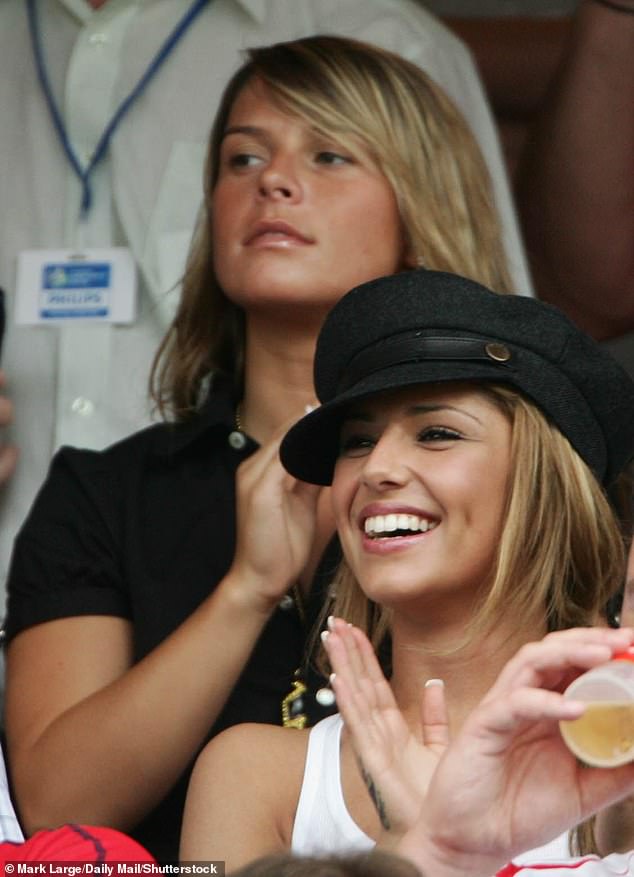 Cheryl Cole (front) and Coleen Rooney (back) are seen supporting England at the 2006 World Cup, a tournament where the WAGs became a distraction.