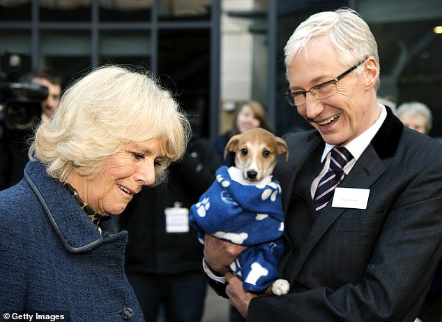 Comedian and presenter Paul died of cardiac arrhythmia in March 2023 at the age of 67 (pictured with Camilla in 2012)