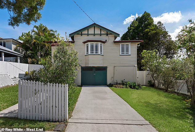 Brisbane's median house price over the past year has soared 15.9 per cent to $920,046, putting it within striking distance of overtaking Melbourne (pictured, a house in Moorooka).