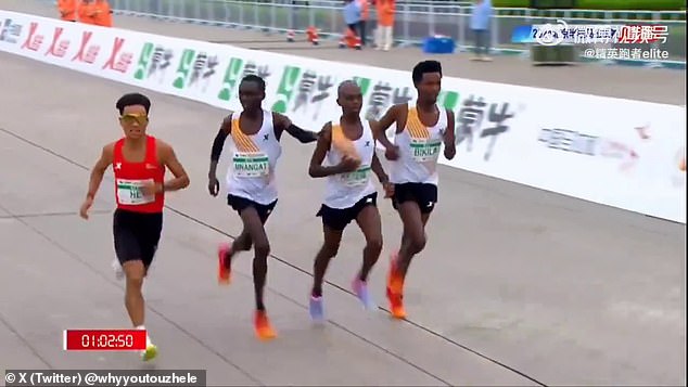 Kenyan runner Willy Mnangat could be seen looking towards Jie and pointing to the finish line before the Chinese athlete moved to the front.