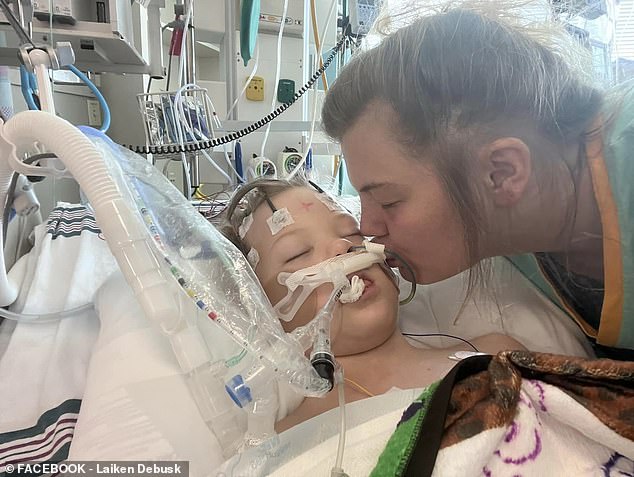 Aiden Debusk, a seven-year-old boy from Arkansas, was placed in a medically induced coma last year after contracting ehrlichiosis, a tick-borne disease.