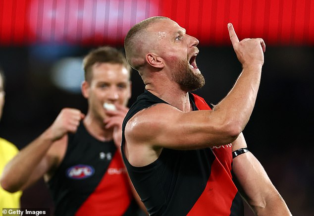 Jake Stringer (pictured celebrating goal against the Bulldogs) has spoken about how he is exploring a new religious faith.