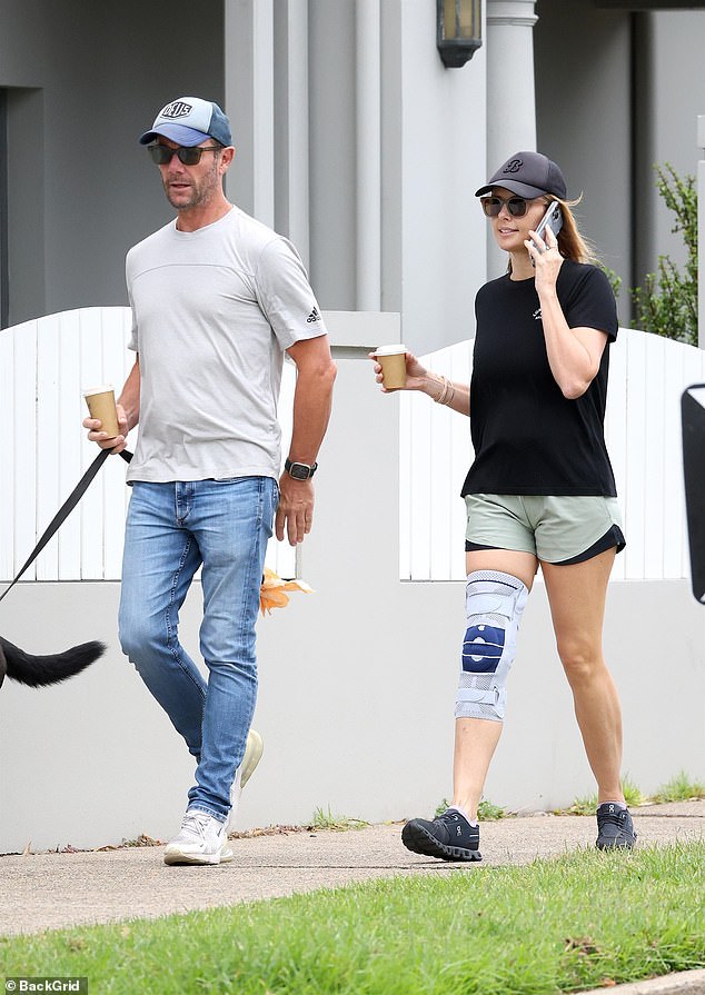 Allison Langdon was spotted wearing a knee brace during a walk with her husband, media executive Michael Willesee Jr., in Sydney on Thursday morning, three years after a horrific TV accident.