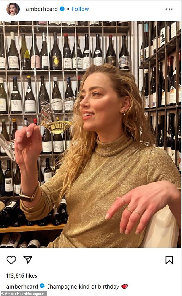 Amber Heard said she was having a 'champagne birthday' as she celebrated turning 38 on Tuesday, as she was photographed in a post on her Instagram page relaxing in a wine cellar while sipping a glass of champagne on the special occasion.