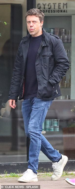 Andrew Buchan proudly showed off his wedding ring during a family outing on Friday