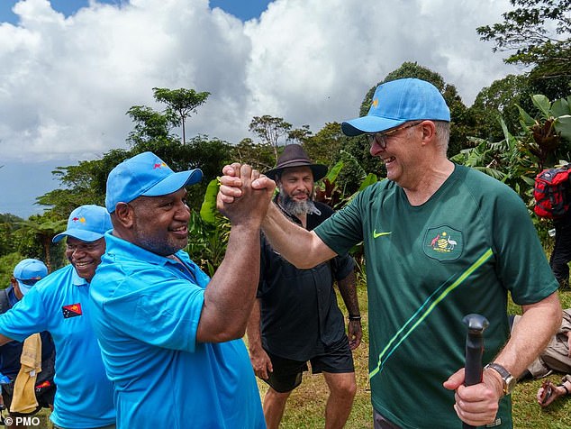 Anthony Albanese (right) will join Papua New Guinea Prime Minister James Marape (left) at the annual Anzac Day dawn service at the Isurava memorial site.