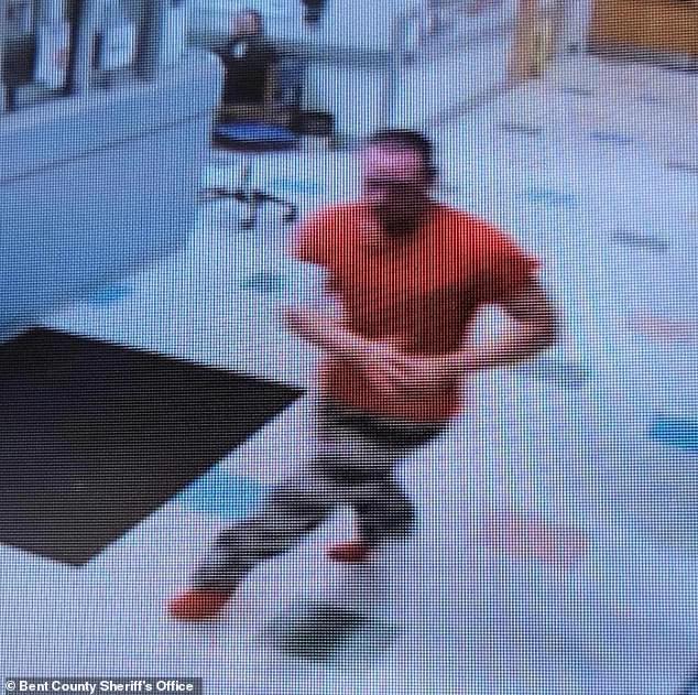 Surveillance footage shows the moment Ronald Collier, 38, escaped from the Arkansas Valley Regional Medical Center in Colorado on Thursday, despite being handcuffed.