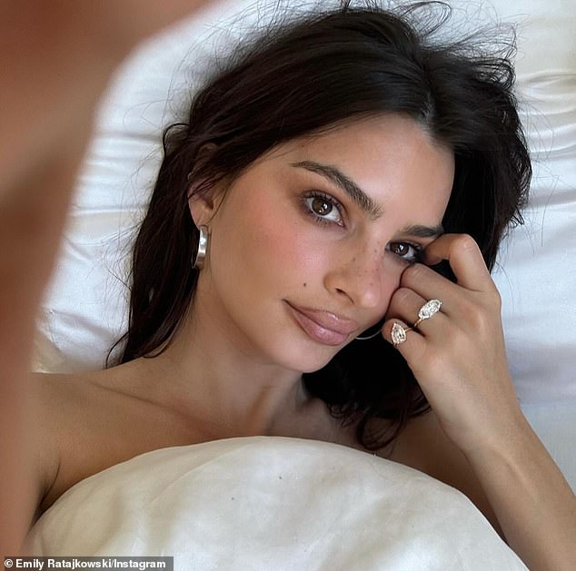 Model Emily, 32, has made the concept of 'divorce rings' famous by revealing she split her engagement ring into two dazzling bands after splitting from Sebastian Bear-McClard.