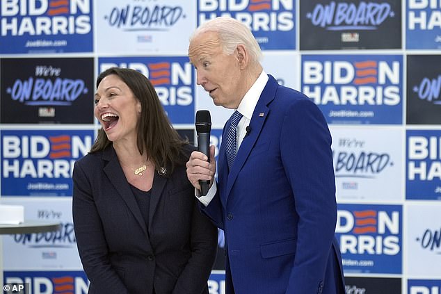 President Joe Biden speaks during organizing event as Nikki Fried laughs
