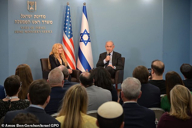 This comes as Biden called on Israeli Prime Minister Benjamin Netanyahu to redouble his efforts to reach a ceasefire in the six-month war in Gaza.  (Pictured: Netanyahu meeting with visiting Republican lawmakers in Jerusalem on Thursday)
