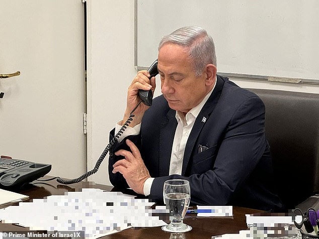 The comments were made by Biden during a phone call between the two leaders.  Netanyahu is seen speaking on the phone with Biden