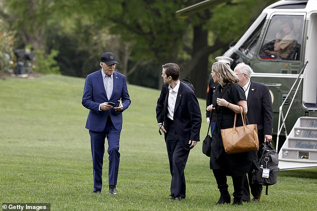 President Joe Biden walks to the White House last week with senior members of his staff, including Deputy Chief of Staff Bruce Reed, Senior Advisor Mike Donilon and Deputy Chief of Staff Annie Tomasini.
