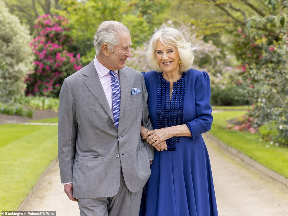 King Charles III and Queen Camilla, taken by portrait artist Millie Pilkington, in the gardens of Buckingham Palace on April 10, the day after their 19th wedding anniversary.  The image is published today to mark the first anniversary of his coronation.