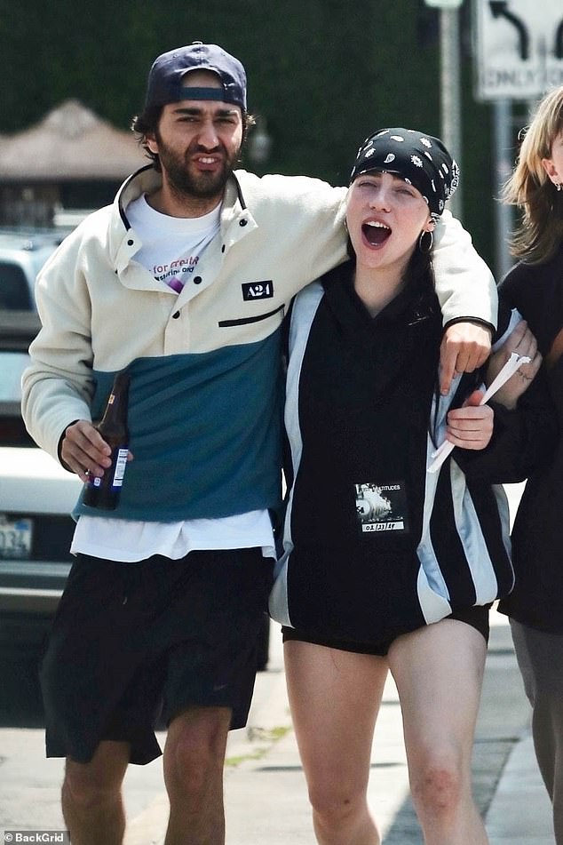 Billie Eilish and actor Alex Wolff put on a very friendly display as they stepped out hugging each other in Los Angeles on Thursday.