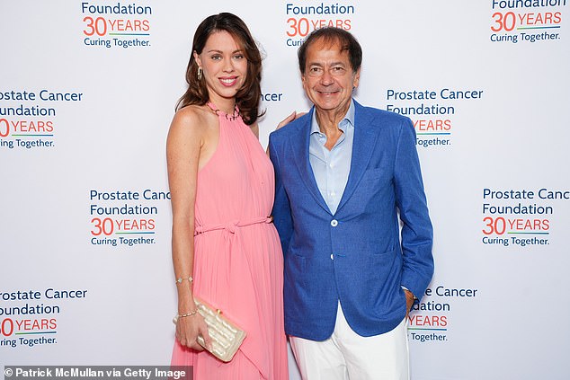 Billionaire John Paulson is officially off the market and engaged to his girlfriend Alina de Almeida.