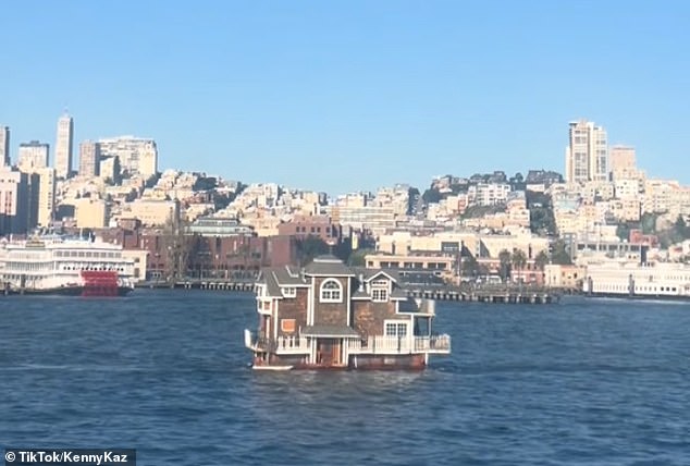A large shingled houseboat was seen floating in San Francisco Bay after its owners were evicted from the nearby marina that once housed more than 100 residents.