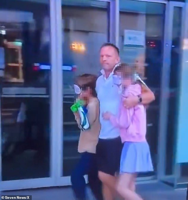 A father has been hailed a hero for putting masks on his children so they wouldn't see NSW police responding to a mass stabbing.
