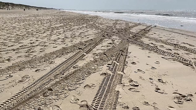 The Briton reportedly traveled at high speed across the sand as tourists sunbathing on Le Touquet beach in the Pas-de-Calais region of northern France scrambled for safety (in the photo: tire tracks in the sand after the fun ride).