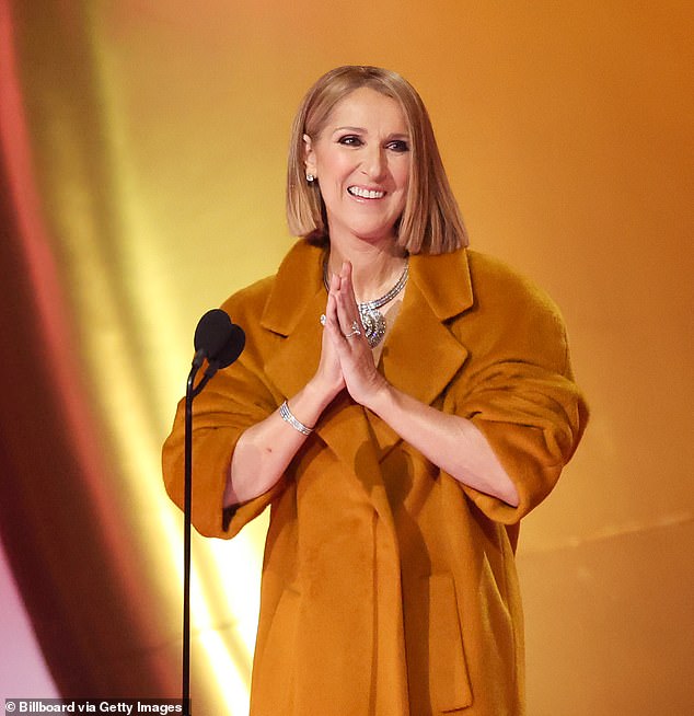 Celine Dion, 56, revealed the reason she decided to wear a coat while making a surprise appearance at the 2024 Grammys in February;  seen on the stage of the event