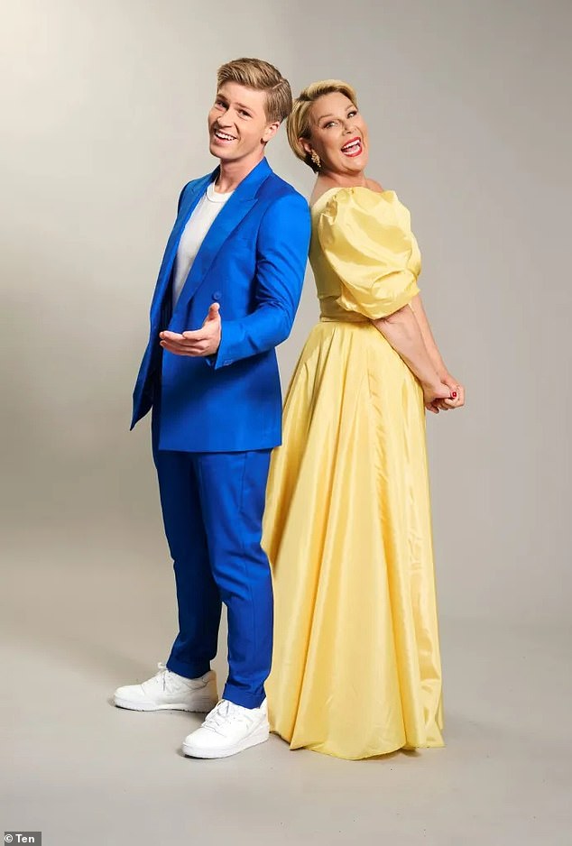 Channel 10 has confirmed that Robert Irwin will return as co-host for the 2025 season of I'm A Celebrity in South Africa.  (Pictured with co-host Julia Morris)