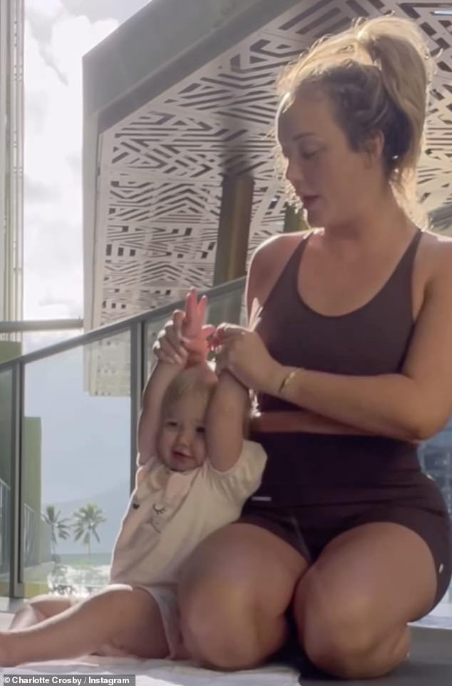 In the clip, Geordie Shore cast member Charlotte could be seen working out while on holiday while Alba played nearby.