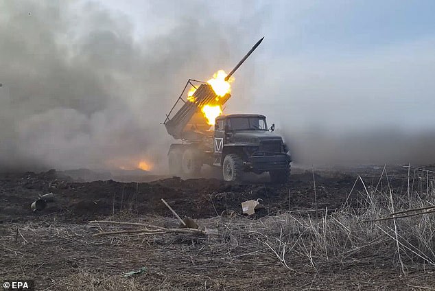 China has increased its support for Vladimir Putin's war in Ukraine by sending military equipment to Russia, US officials said.  Pictured: A Russian missile launcher fires rockets toward Ukrainian troops in this image released April 4.