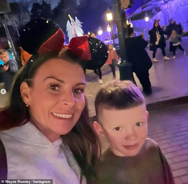 Wayne also shared other photos of the star taken at Disney World where he posed with his young children (pictured with son Kit).