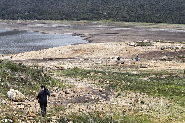 Extensive beaches have formed due to the low water level in the San Rafael reservoir in La Calera, a city near Bogotá, capital of Colombia.