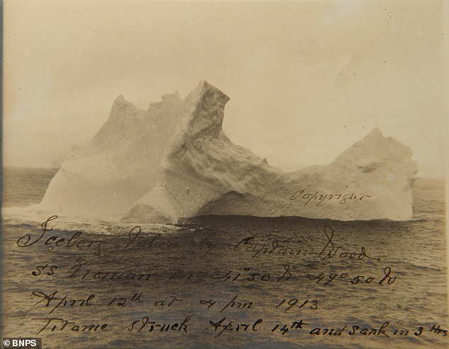 A newly unearthed photograph of the iceberg that may have sunk the Titanic has emerged 112 years after the disaster.  The black and white image was captured by an undertaker working on the body recovery ship that arrived at the wreck site after the sinking.