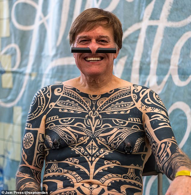Drew Powell, 67, from Washington DC, is covered in ink and has several extreme body modifications.