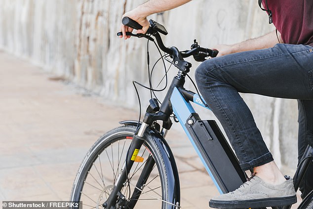 A man on a bicycle.  Exercise can cause more widespread swelling, and this could be why the pain worsens with these movements.  One treatment option would be to try an anti-inflammatory gel or cream (file image)