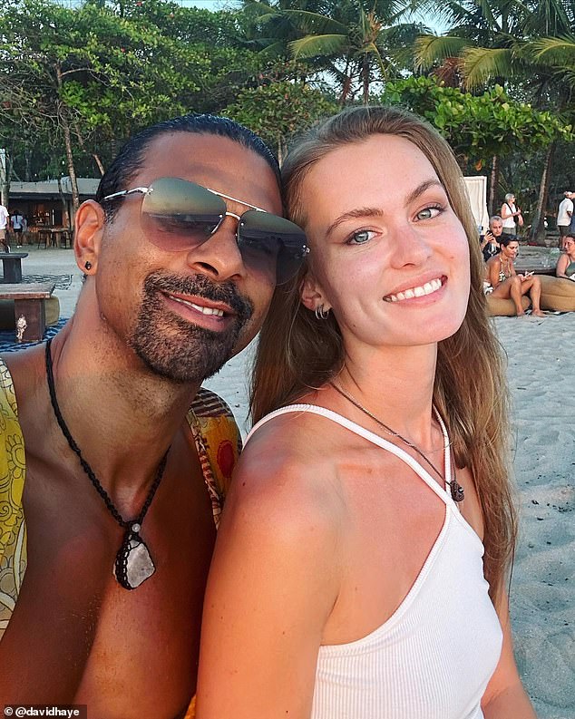 David Haye, 43, and his girlfriend Sian Osbourne, 32, are looking for a new lady to join their 'couple' and the boxer posts a racy ad on dating app Raya.