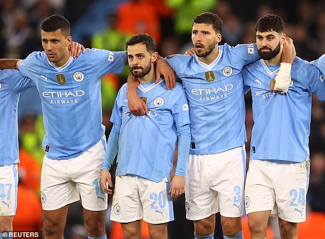 Bernardo Silva (second from the left) had to wait before taking - and missing - his penalty against Real Madrid