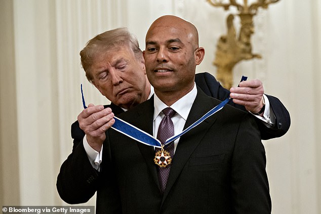 Trump, left, presents the Presidential Medal of Freedom to Mariano Rivera in the East Room