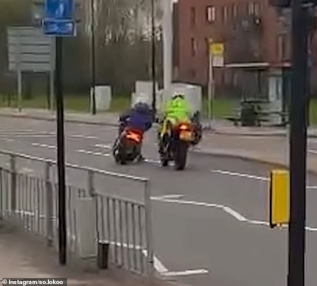 This is the moment a police motorcycle collides with the scooter of a fleeing suspect