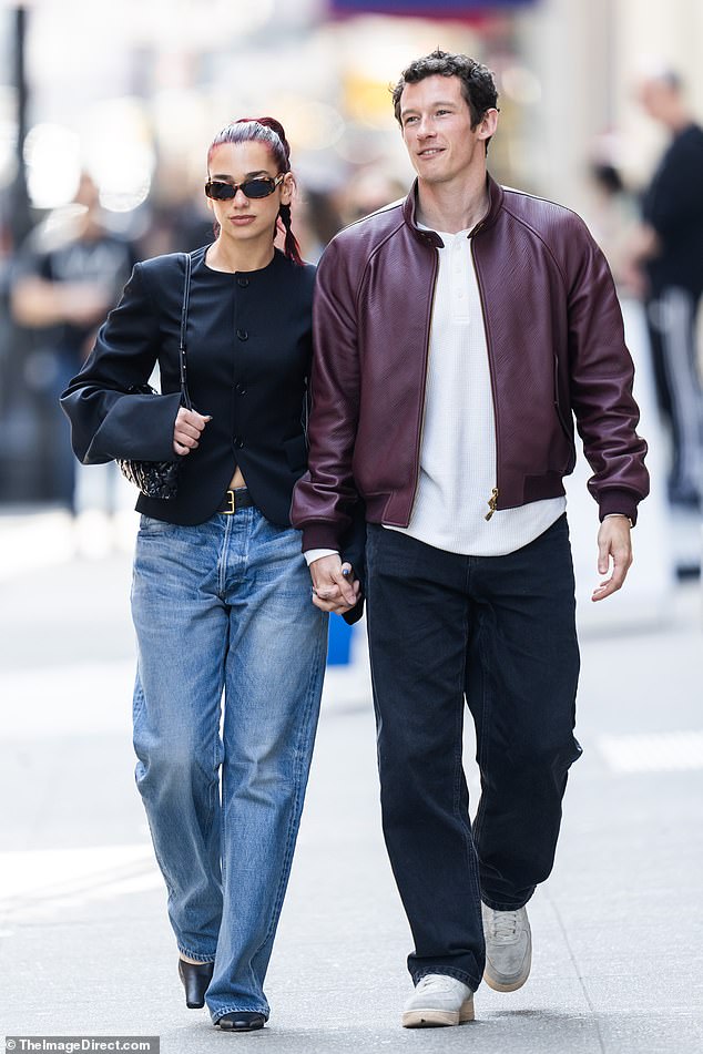 Dua Lipa and her boyfriend Callum Turner continued to live up to their fairytale romance as they were spotted putting on a very loved-up display while out and about in New York City.