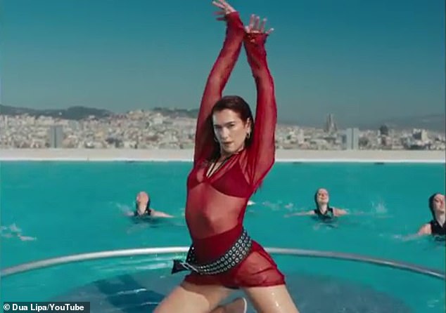 Dua Lipa sizzles in her new music video for single Illusion, released Thursday.