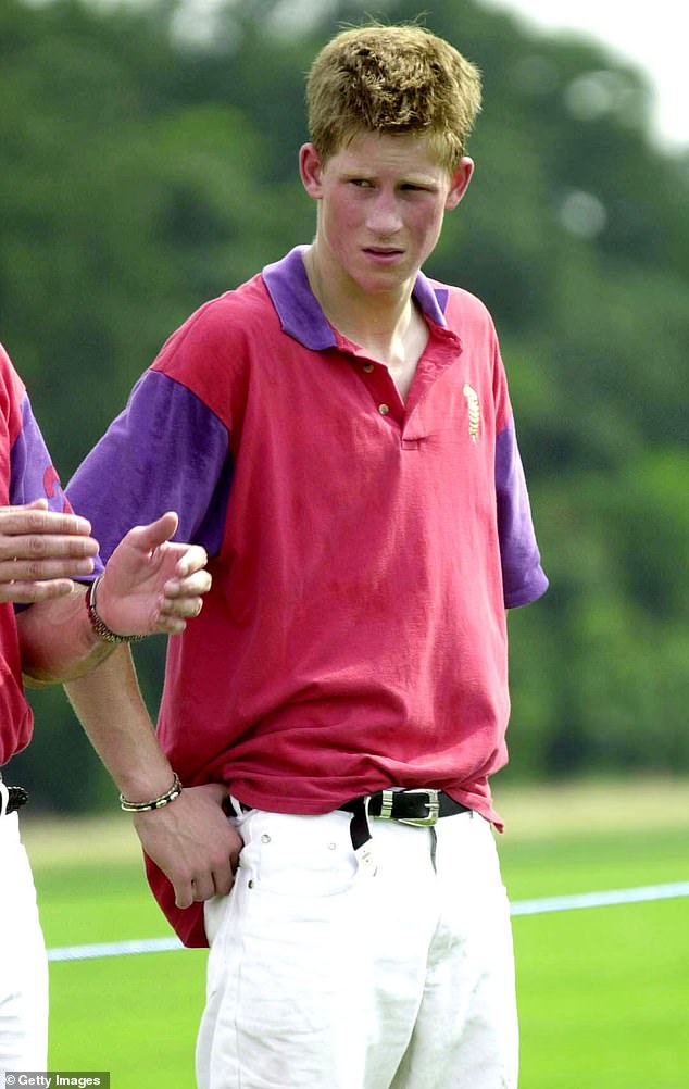 Prince Harry photographed months before his 17th birthday in July 2001 at the Cirencester Polo Club.