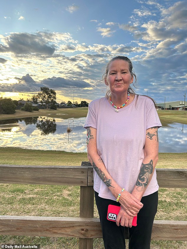 Emma Bates (pictured), 49, was found dead inside her home in Cobram, near the New South Wales border in Victoria's far north, about 2.15pm on Tuesday, after of having suffered injuries to the upper part of the body and face.