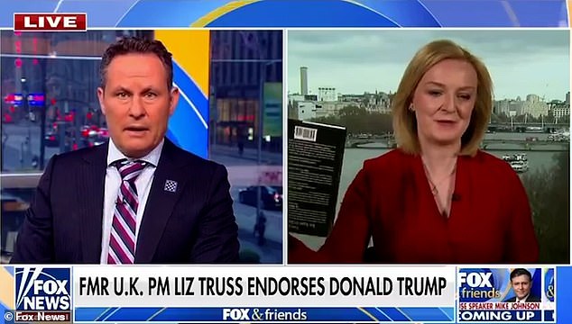 Liz Truss couldn't hold her book, Ten Years to Save the West, on the right side of Fox News
