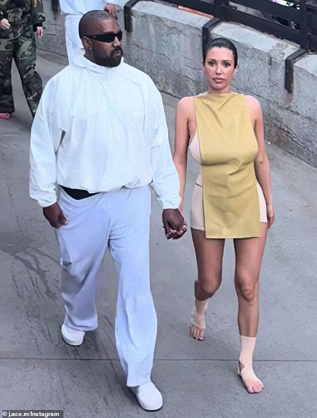 Fans have taken aim at Disneyland California for allowing 29-year-old Bianca Censori (right, with Kanye West) to walk through the theme park without shoes on Tuesday.