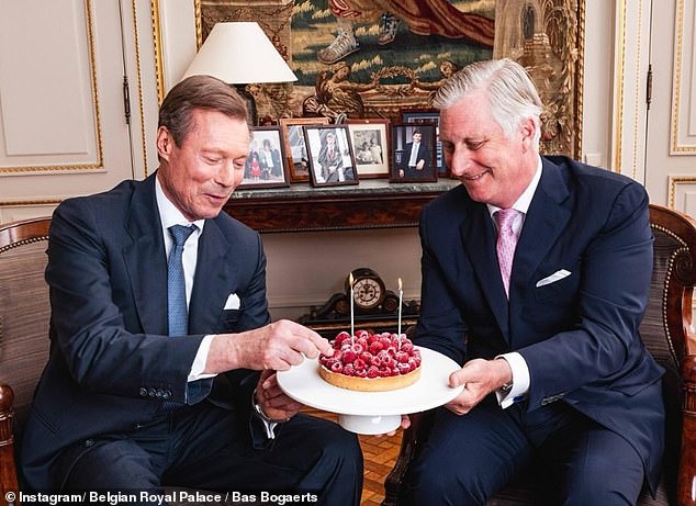 First cousins ​​King Philippe of Belgium (right) and Grand Duke Henri of Luxembourg (left) appeared in high spirits as they celebrated their respective birthdays with a joint cake.