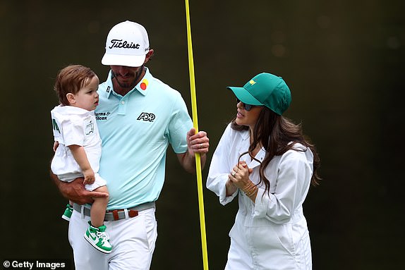 AUGUSTA, GEORGIA - APRIL 10: Max Homa of the United States with his wife Lacey and son Cam during the par three contest prior to the 2024 Masters Tournament at Augusta National Golf Club on April 10, 2024 in Augusta, Georgia. (Photo by Maddie Meyer/Getty Images)