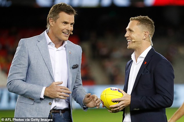 Luke Darcy (pictured left with football teammate turned commentator Joel Selwood) took aim at 'mean' Kane Cornes in a shocking attack on live radio.